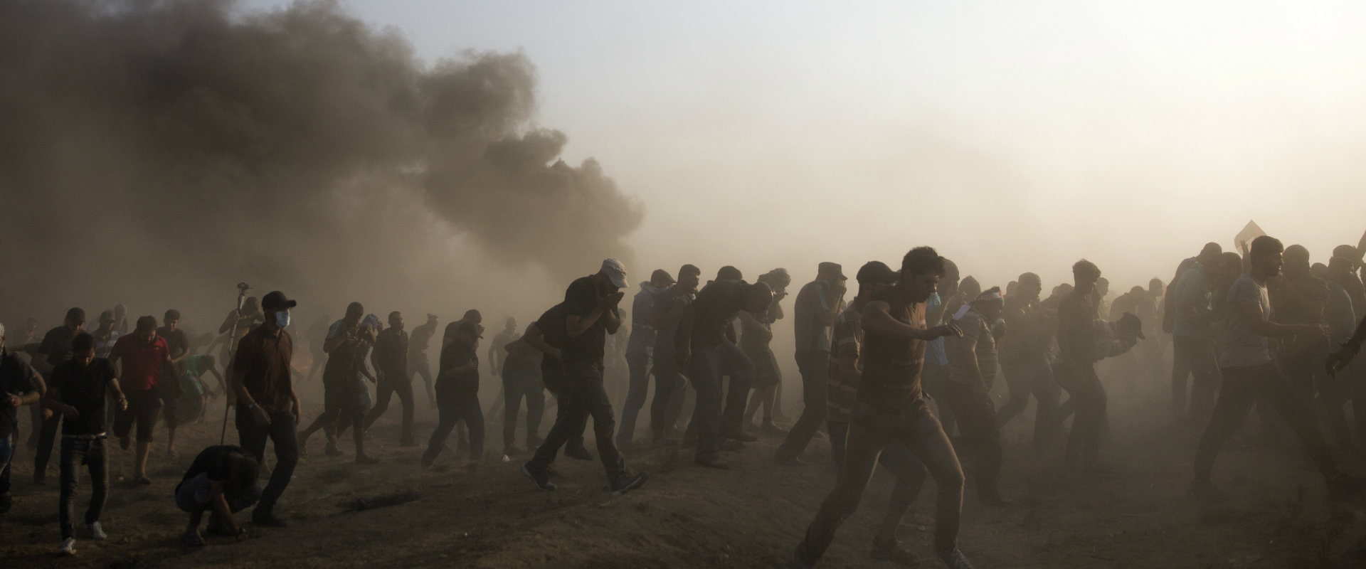 פלסטינים מפגינים בעזה, בשבוע שעבר